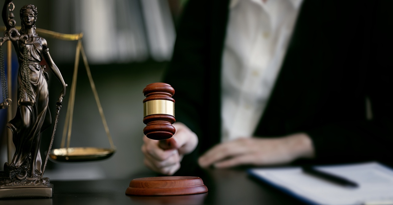 justice and law concept closeup judge hand holdin 2026 01 06 09 27 07 utc