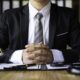 person in suit with scales of justice 2026 01 08 02 17 41 utc 80x80
